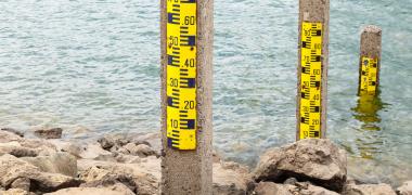 Pillars in a body of water measuring water levels