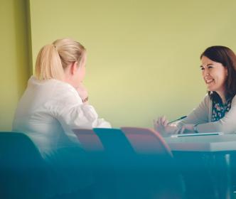 Two Uisce Éireann employees having a meeting