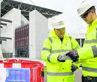 Two Uisce Éireann workers at a site